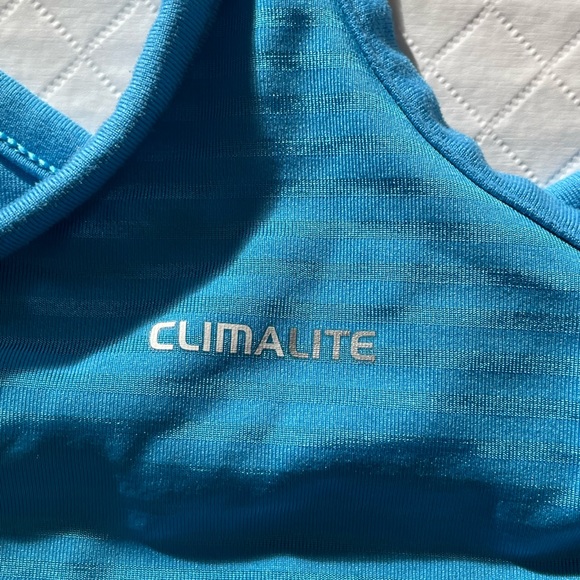 Bundle of two athletic tank tops both in size large. - Picture 12 of 15